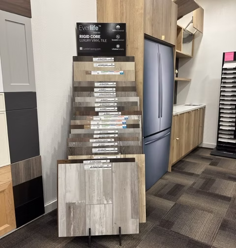 a close up picture of floor samples in a rack 