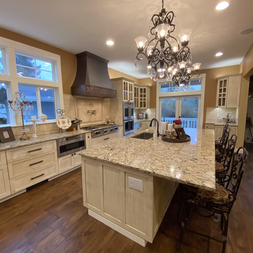 Start Your Custom Build: Now Accepting Projects for Summer and Fall 2026 1 Elegant kitchen with granite countertop.