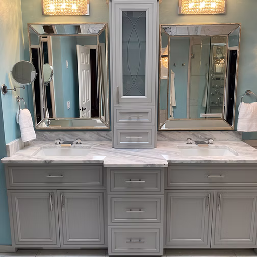How Custom Layouts Increase Home Value in the South Sound 1 a bathroom with his and hers sinks, two mirrors on either side, and white drawers
